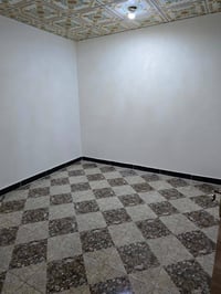 شقة ارضية • الجنينة شارع المصلحة • ٥٠م