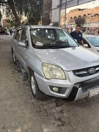 كيا سبورتج موديل ٢٠٠٩ ماشيه ١٧٩ الرقم بغداد  سعرها ١٢٠ وبيها مجال بصيط...