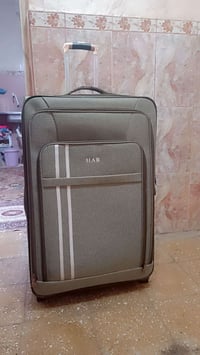 جنطة نصيفية • مستعملة مرة • قياس كبير