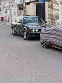BMW   735 أصل وفصل بليته وسنويه  كفاله عامه فقط صبغ جماليه  بجم شرط كب...