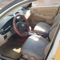 نيسان سني 2013 رقم بغداد باسمي سياره تبريد تدفئه صدر امامي خلفي ما بيه...