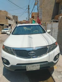 كيا سورنتو خليجي ابيض بغداد قماره حديد مواصفات عاديه بإسمي ٤ سلندر مكف...