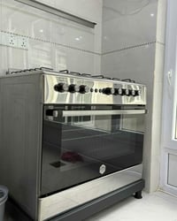 بوتجاز ٥ عيون • ستانلس ستيل • بلا عيب