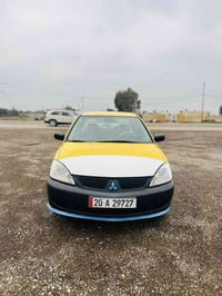 لانسر ٢٠١٠ • محرك ١٥٠٠ • رقم ديالى