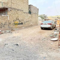قطعة ارض للبيع 100م رئاسة شارع 20 قرب معمل البواري  07707166008