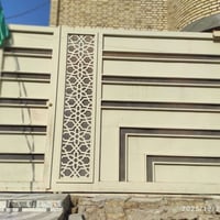 باب حديد • ٢م ونص عرض • ٢م و١٥سم ارتفاع