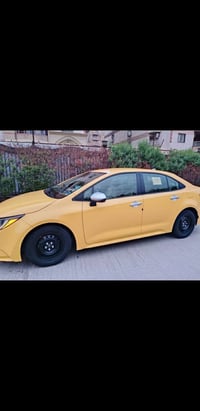 البيع كورلا هايبرد موديل 2022رقم بغداد انكليزي صور الحادث موجود بل منش...