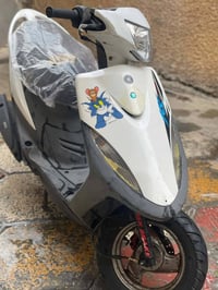 دراجة وكالة • بلكارتون • بغداد العبيدي