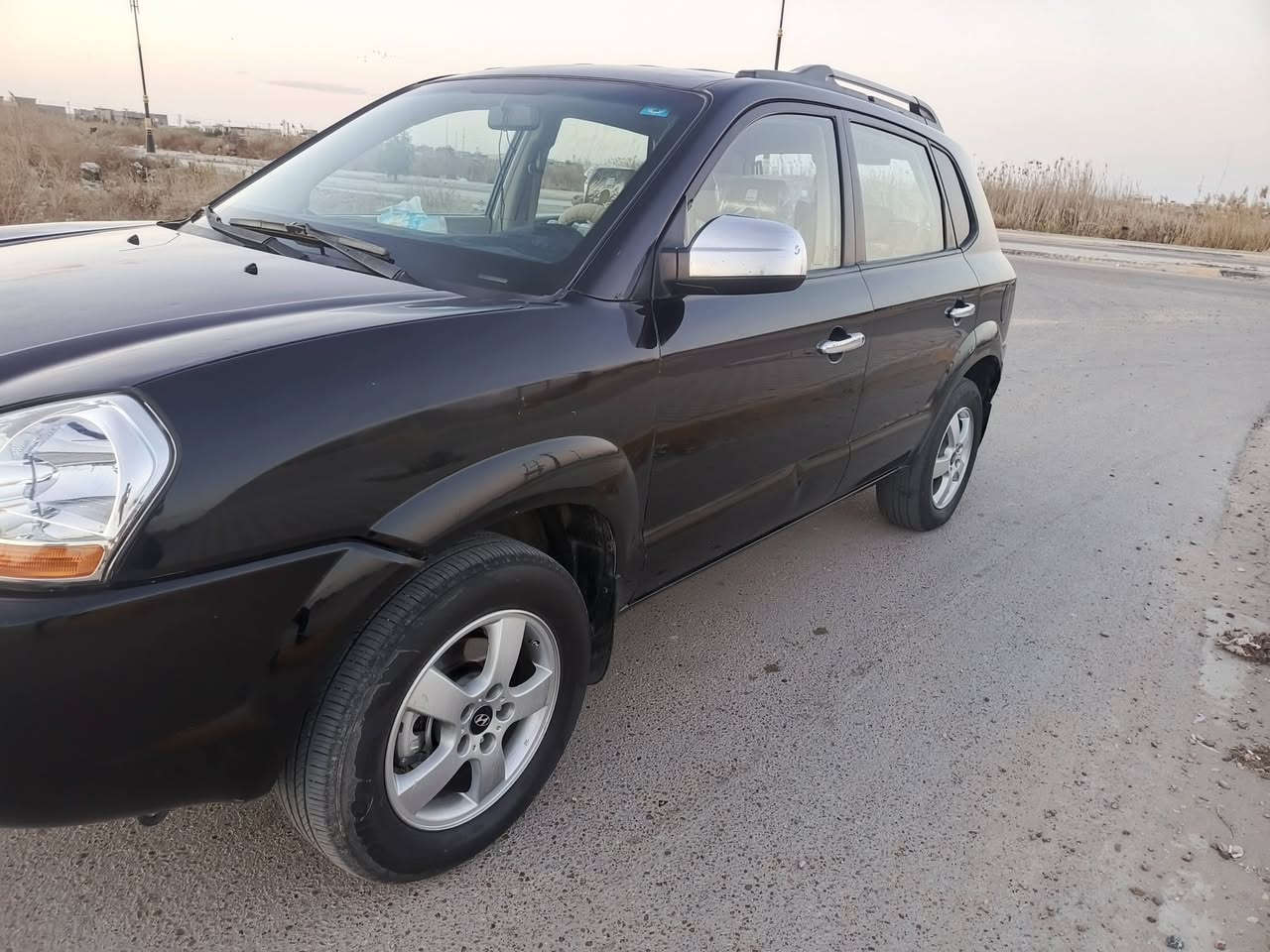 سلام عليكم تحية طيبة توسان موديل 2007مكينة كير مكفولات محرك 2000تبريد ثلج 🥶🥶 حدادية كل جديد علا ايدي امامي خلفي كل جديد موبز مكفولة من اي حادث بيهة بنيد وجوملغ مصبوغ والباقي مكفول تخم تاير وباتري جدد كهرباء كل شغالة مابيها اي نقص رقم بغداد مشروع وطني بسمي مكاني بغداد أبو غريب سعر 95وبيهة مجال قليل جدا هاذة رقمي ***********
