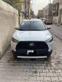 كورلا كروس هايبرد موديل 2024 خليجي مكفولة كفالة عامة  مااشيه 16 الف رق...