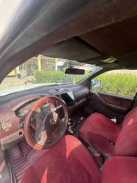 نيفارا موديل 2009 رقم بغداد الانكليزي الجديد كير عادي سيارةمستحقة تجفي...