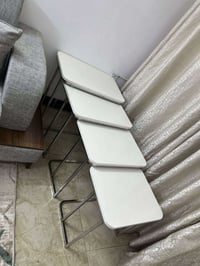 ٤ طبلات • أبيض • قابل تفاوض