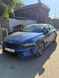 كيا  k5 للبيع 2022 جديده سياره وارد امريكي مكفوله من صبغ فقط تكحيل بال...