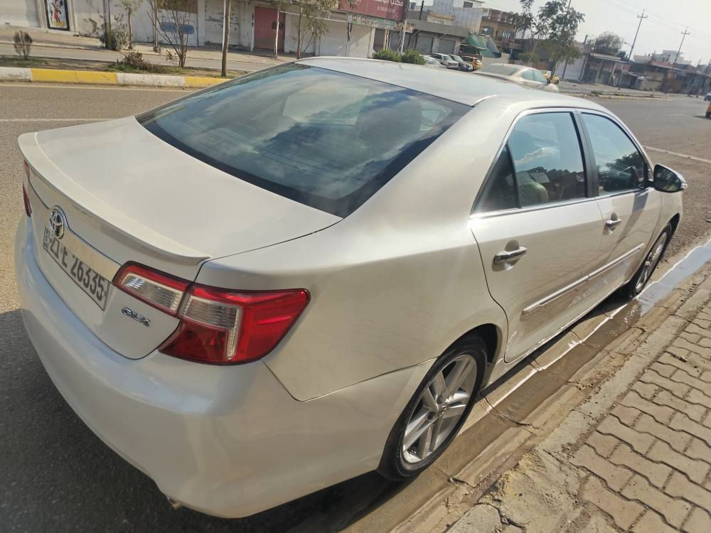 تويوتا كامري موديل 2014 فول مواصفات خليجي ماشي 157الف كيروالمحرك بشرط مامفتوح  تحويل والغرامه بشرط بيهه 5 قطعه  صبغ بدون دواخل مكان سيارة كركوك قادسيه شراي خابر *********** سعر128 كركوك, العراق
