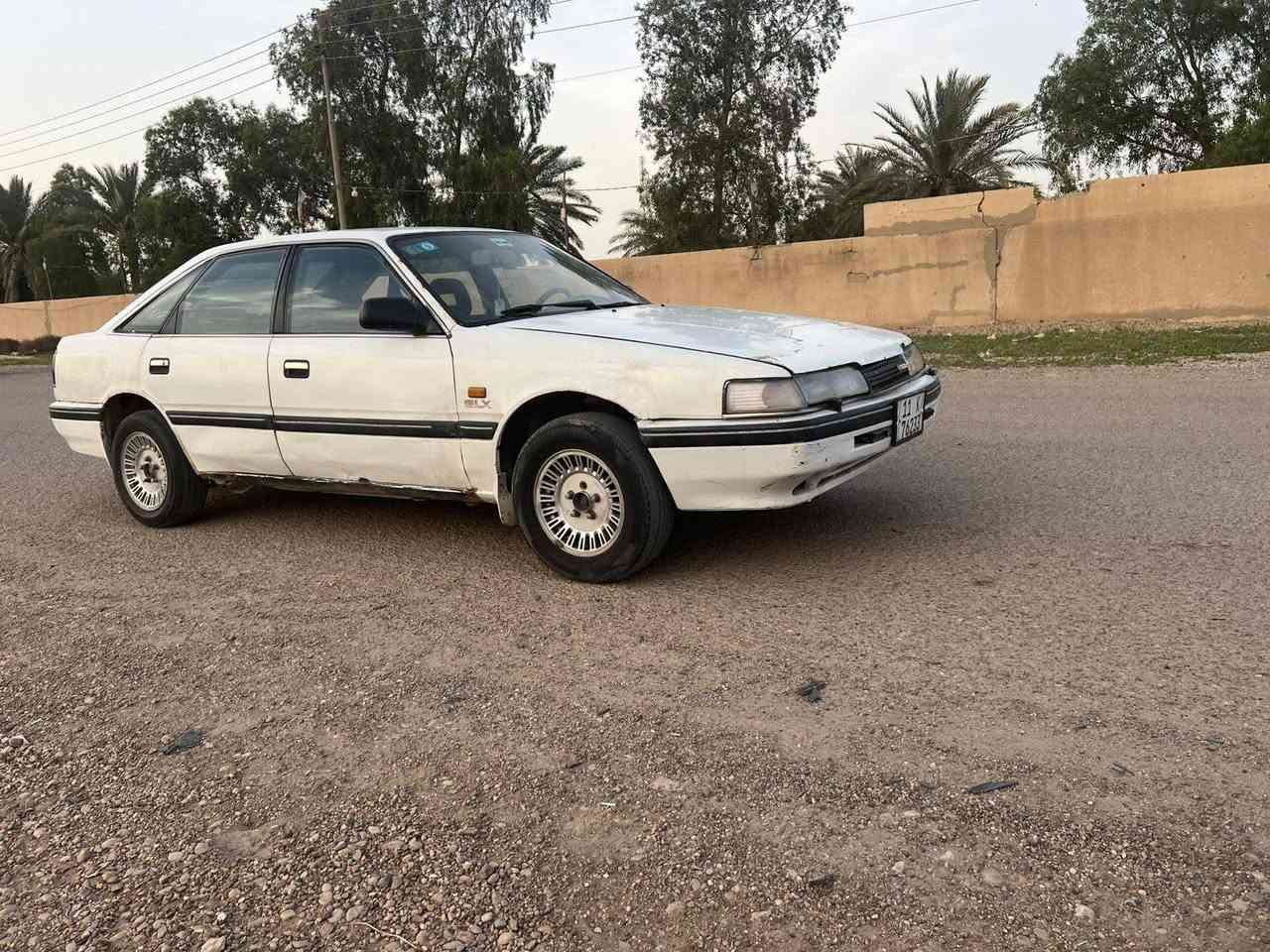 للبيع مازده بغداد رقم نكليزي سنويه لغاية 29 هزه جديده سعر 25$ رقم ‏‪***********‬‏  سياره محرك وكير عادي مكفولات حدادا جيد جداً كهربائيات شغاله ويل كب دواخل نضيفه مكاني بغداد
