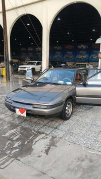 مازدا ٣٢٣ • محرك وكير شرط • كامره امامي وخلفي