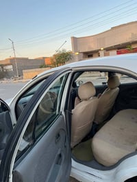 كيا ريو ٢٠٠٥ رقم بغداد السعر ٤٢ وبيها مجال ٠٧٨١٦٤٦٢٤٥٢
