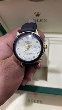 ساعة رولكس ستايل • سوار جلدي • الحلة