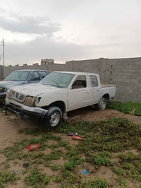 نيسان مزاد 2003 مكان بغداد  السعر 22 اسويلك وكاله 07722227252