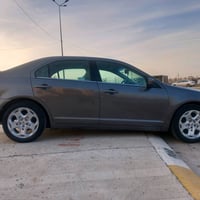 فيوجن 2010 se داخل اصفر بدون صبغ رقم سليمانية سنوية لحد 27  محرك اربعة...