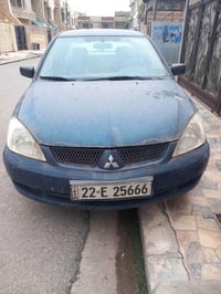 لانسر • ٢٠٠٩ • تؤماتيك