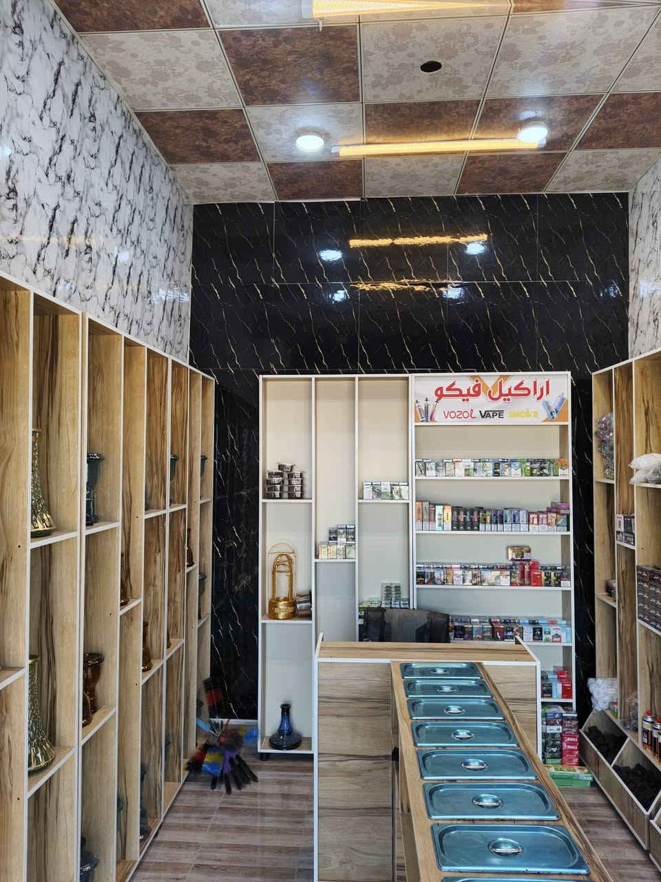 محل نراكيل للبيع كامل بعده جديد ومابي اي نقص ديكور جديد فاترينه مترين ونص بمتر كلشي واضح كبالكم كلشي بي جديد المحل وكلشي بي اريدهن ب 6 ملاين وبي مجال قليل مكاني بصره ابي الخصيب شارع الحي العسكري رقم ***********
