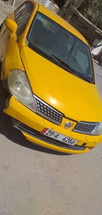 نيسان تيدا للبيع /رقم جديد/ومكينه ومشط جديد/ بسمي  اتبيع هل موجود 0781...
