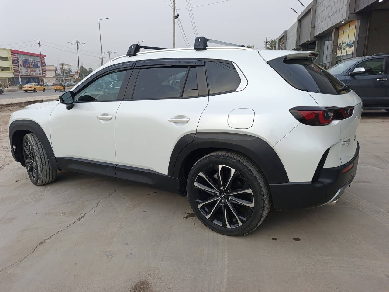 مازدا CX-50 موديل 2024  
محرك 2.5 تيربو 
 فور ويل
فتحة سقف بانورما
كيج الكتروني
بصمة ابواب
فتح واغلاق ذكي بدون مفتاح
صندوق كهرباء 
بصمة تشغيل
بريك بصمة
شاشة دشبول ديجيتال
كير at
كاميرة خلفية
رادار امامي (تحديد مسار)
رادار جانبي (نقاط عمياء)
رادار خلفي (التحذير من الاصطدام)

ثلاث انظمة قيادة
NORMAL :
SPORT:
OFF-ROAD :
داخل مشمشي
كشنات جلد نابا
كشنات كهربائي
كشنات هيتر
كشن ذاكرة
قطعتين تبريد 
تحكم استيرن
مثبت سرعه
شاشه لمس كبيره
توقف ذاتي 
ماسحات اوتو
لايت اوتو
ترحيب وفتح وقفل ابواب اوتو
لايتات LED عدسة زينون بلادي
بكلايتات LED بلادي
وبعد هواي مواصفات والاهم ياباني ومتانه فول 
زعانف قمارة بلادي أصلي 
ماشيه 22 الف ميل 
صبغ فقط قطعتين بدون دواخل بدون معجون بدون شواصي وتخم تاير أصلي 2025
السياره حره باسمي بدون رقم
7MMVABXY4RN155421
السعر خاص
رقم الهاتف ***********
