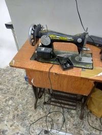 مكينة ام الفراشه • خياطة