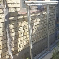 كربلاء • باب مشبجة حديد • ١٨٠×١٥٠سم