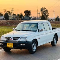 ميتسوبيشي • ٢٠٠٤ • غاز وبنزين