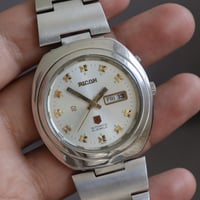 ريكو • اوتوماتيك • ٢١ حجر