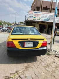 لانسر بومه مديل 10 بيها ضربه بلجاملغ الخلفي ومعمره اي نقص ما بيها ...م...