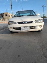 بروتون 2004 اوتماتيك رقم بغداد بسمي جاهزة تدفئة تبريد شغال بس ضعيف تخم...