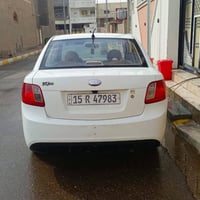 كيا ريو • ٢٠١٢ • رمادي