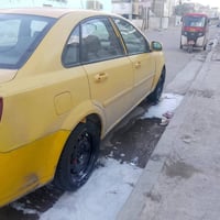 عندي اوبترا 2011 مال شركه العامه رقم بغداد صدامي صاحب سياره موجود هذا ...