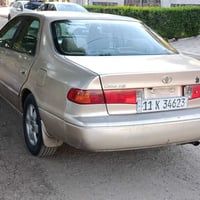 عندي كامري موديل 2000 رقم بغداد انكليزي تبريد شغال صدر خلفي وامامي جدي...