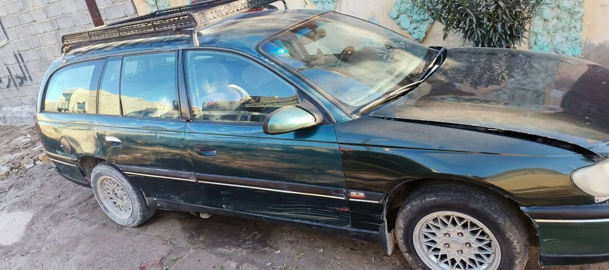 السلام عليكم
 اوبل اوميكا بزون ستيشن للبيع  لون زيتوني رقم  بغداد محركة ونجي 2500 مكفول بس الكير واكف ما تمشي السيارة السعر 28ورقة للأستفسار *********** زوج تاير امامي جديد قبل يومين شديتة والخلفي نص عمر كشنات نضيفة كهربائيات شغالة
