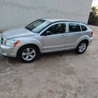 دوج كاليبر 2010  مكينه 2400 كلش نضيفه محرك vvt شرط ياكل الكاع سياره ما...