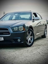 تشارجر مديل 2013 رقم بغداد بسمي السياره كفاله عامه من كلشي لاصبغ لأفتح...