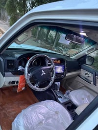 باجيرو 2015 مكفوله من الصبغ حبتور بيه فقط بارد ب أماكن فقط قليله  كير ...