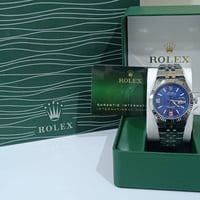 روليكس • ستانلس ستيل • سويس ميد