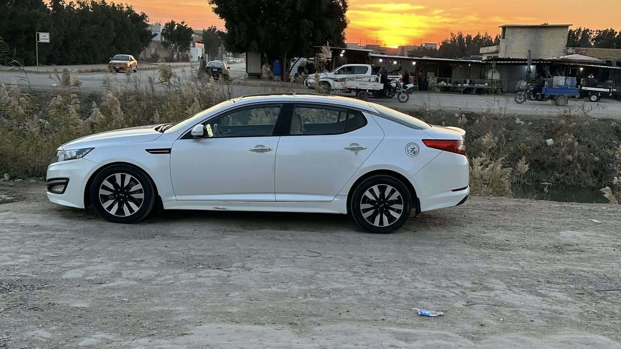 السلام عليكم كيا اوبتيما للبيع موديل ١٣ خليجي مكفوله من الصبغ بيهه قطعتين تبديل  مال مؤسسه نفس اللون مطابق شركه حته السونار مايميزه وفتح براغي لغرض التكعيد محرك مكفول كير حداديه جديده تخم تاير باتري جديد  سنويه رقم بغداد انكليزي بسمي مكاني ديوانية *********** السعر ١٢٣ مجال قليل حك الجيه @
