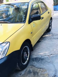 لانسر موديل 2010   رقم بغداد دولي   كير محرك حاوية صدر امامي خلفي تخم ...