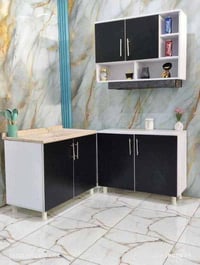 كاونتر خشب mdf قياس متر  وسنك متر  ملحق متر  هيكل Mdf.   السعر 195الف ...