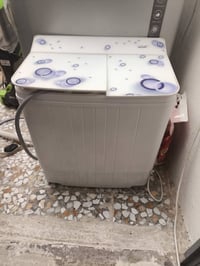 غسالة • جديدة • حجم صغير