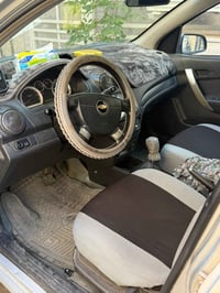 شوفرليت افيو للبيع موديل 2009 لون سلفر مكينة 1600  مواصفات LS  ماشية 1...