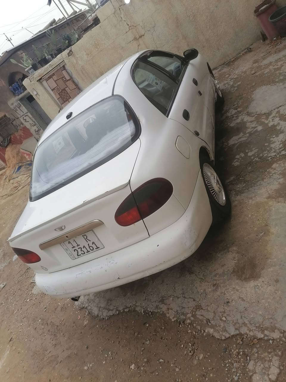 السلام عليكم للبيع دايو لانوس موديل 1998 رقم بغداد مكينه وكير جدد صدر امامي خلفي جديد مكفولة من الضربه والتبديل  تبريد شغال سنويه 2028باسمي مكان بغداد السعر 31 وبيها مجال بسيط رقم الهاتف ***********
