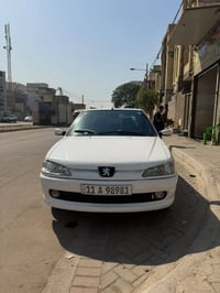 بيجو 306 للبيع موديل 2003 رقم بغداد باسمي الرقم تقريبا مميز   بدون ضرب...