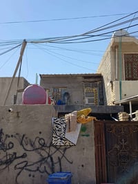 نصف قطعة • ١٢٥م • الطارق القديم بغداد